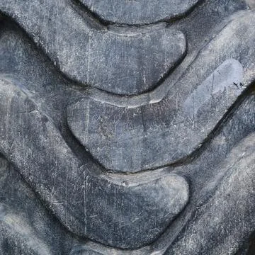 Threadbare tire surface fragment Stock Photos