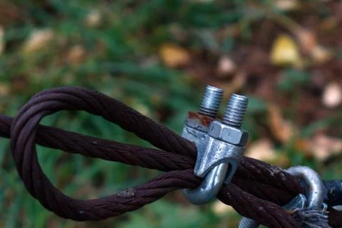 Threaded connection close-up on blurred forest background Stock Photos