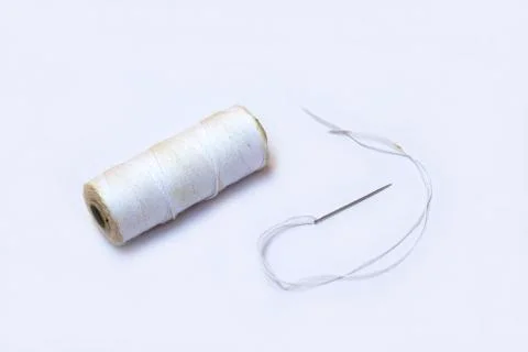 Threaded Needle and Roll Stock Photos