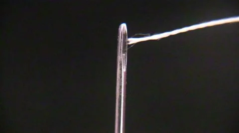 Threading the eye of a needle Video stock 54128309