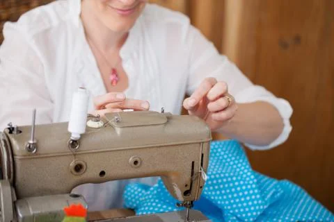 Threading a needle Stock Photos