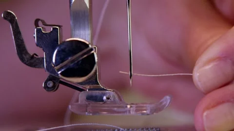 Threading A Needle On A Sewing Machine Stock Footage 243613657