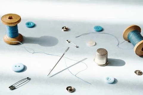 Threads and different tools for sewing. Stitching instruments. Needlework hob Photos