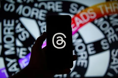 Threads and Instagram app logo on mobile screen Stock Photos