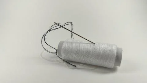 Threads and needles. Sewing clothes. Stockfoto's