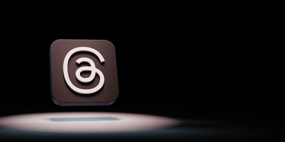 Threads App Icon Spotlighted on Black Background Stock Illustration