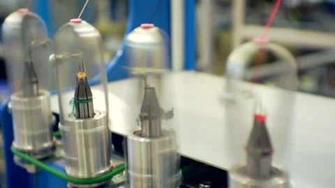 Threads are pulled through the rotating parts of the textile machinery.close-up. Video stock 150018209