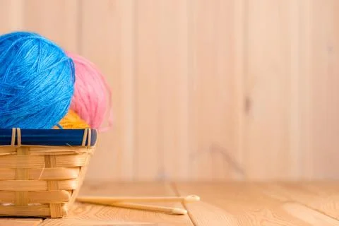 Threads in a basket close-up and space for inscription on the right Stock Photos
