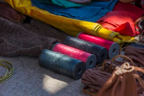 Threads in coils and fabrics Stock Photos