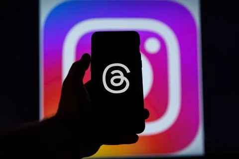 Threads an instagram app logo on mobile phone screen Stock Photos