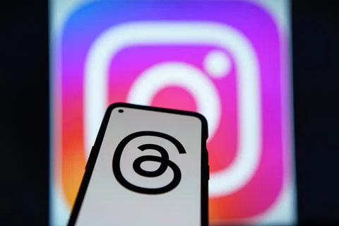 Threads an instagram app logo on mobile phone screen Stock Photos