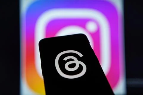 Threads an instagram app logo on mobile phone screen Stock Photos