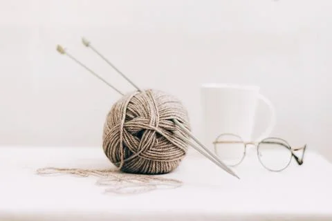 Threads for knitting, from natural environmentally friendly wool, close-up on a Stock Photos