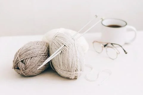 Threads for knitting, from natural environmentally friendly wool, close-up on a Stock Photos