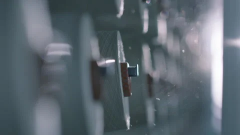 The threads in the loom unwinds from the spool, raising dust. Stock Footage 263463784