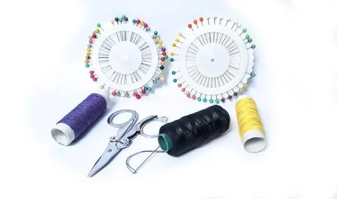 Threads needles and knife for sewing Stock Photos