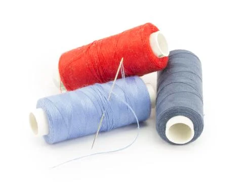 Threads, needles Stock Photos