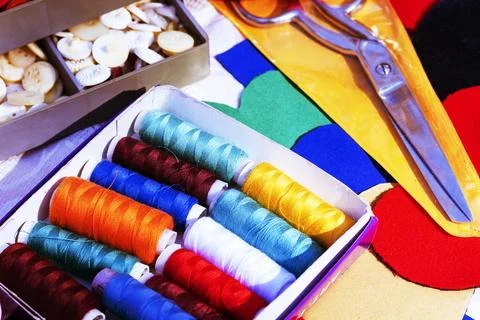 Threads, scissors and fabrics.  Objects for sewing.close-up Accessories for.. Stock Photos