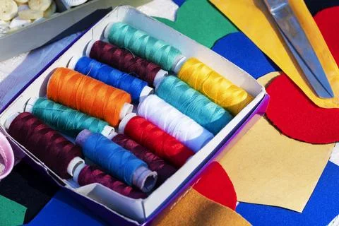 Threads, scissors and fabrics.  Objects for sewing.close-up Accessories for.. Stock Photos