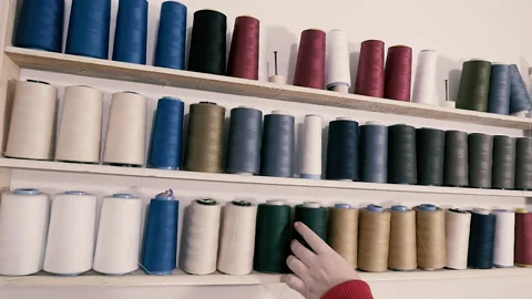 Threads. Shelf with multi-colored threads. Stock Footage 155817692