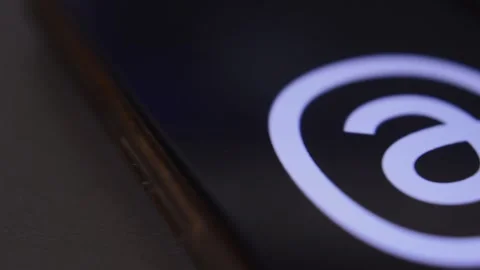Threads social media app by meta. Threads app icon logo on the phone display. Stock Footage 258929655