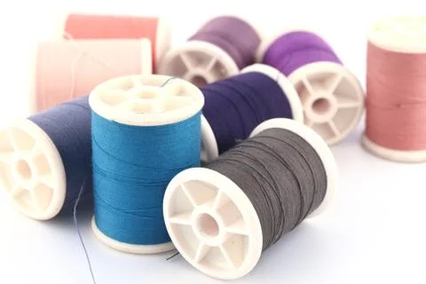 Threads in spools isolated in white background Stock Photos