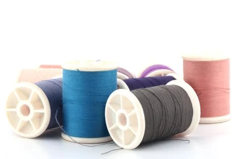 Threads in spools isolated in white background Stock Photos