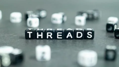 Threads word in black block bead letters. Social media concept Stock Photos
