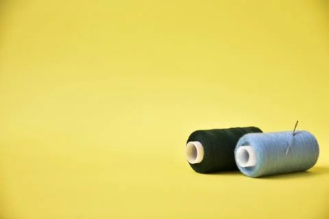 Threads on a yellow background. art soft focus Stock Photos