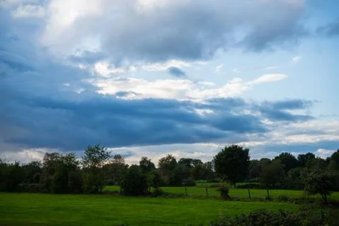 Threatening cloud formations  in the sky from the coming storm, while the blu Stock Photos