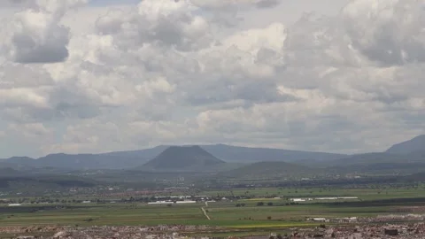 Threatening clouds overhanging an Ancient Volcano Stock Footage 314342517