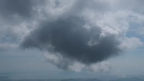 Threatening dark clouds covering the sky Stock Footage 316956617