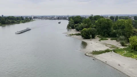 Threatening shot over a river in Germany with wide banks and a load of 스톡 동영상 256620910
