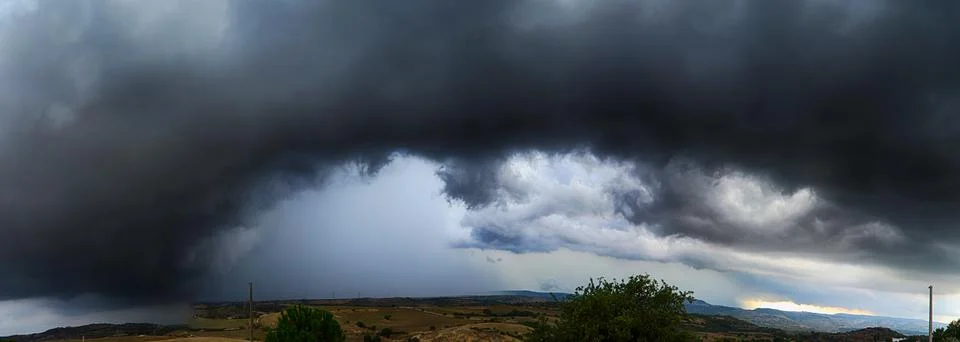 Threatening skies. Rain clouds and black sky textured background. Thundersto Stock Photos