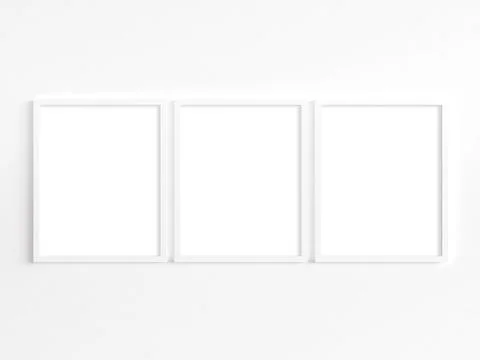 Three 8x10 white frames with portrait orientation 库存照片