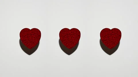 Three Abstract Cartoon Red Hearts stopmotion animation for Valentine's day Stock Footage 229496267