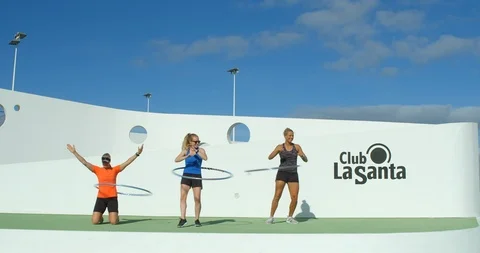 Three Aerobics Instructors doing a Hula Class and having fun. Video stock 86138950