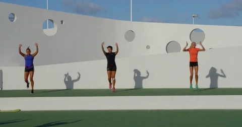 Three Aerobics Instructors take an Aerobics Class. Vídeo Stock 79823144