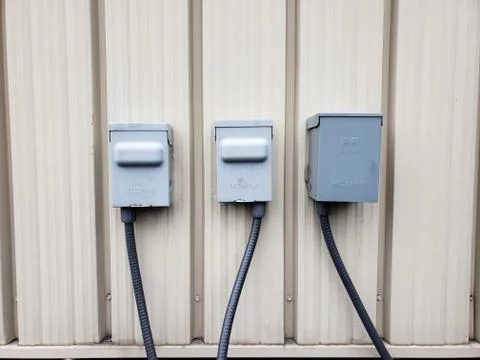 Three Air Conditioning Condensing Unit Disconnect Boxs Stock Photos