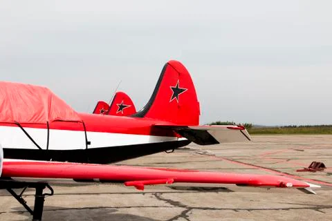 Three airplane on the field Stock Photos