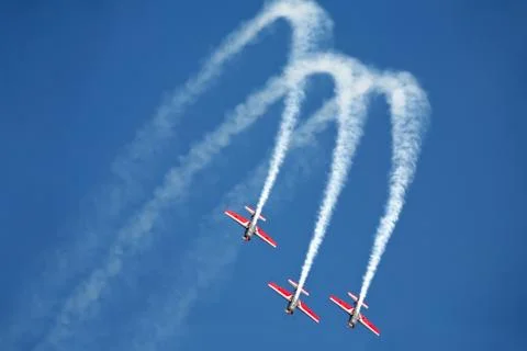 Three airplanes extra ea-300 on airshow Stock Photos
