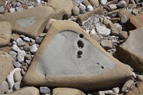 Three Angle Shaped Stone on the Beach Stock Photos