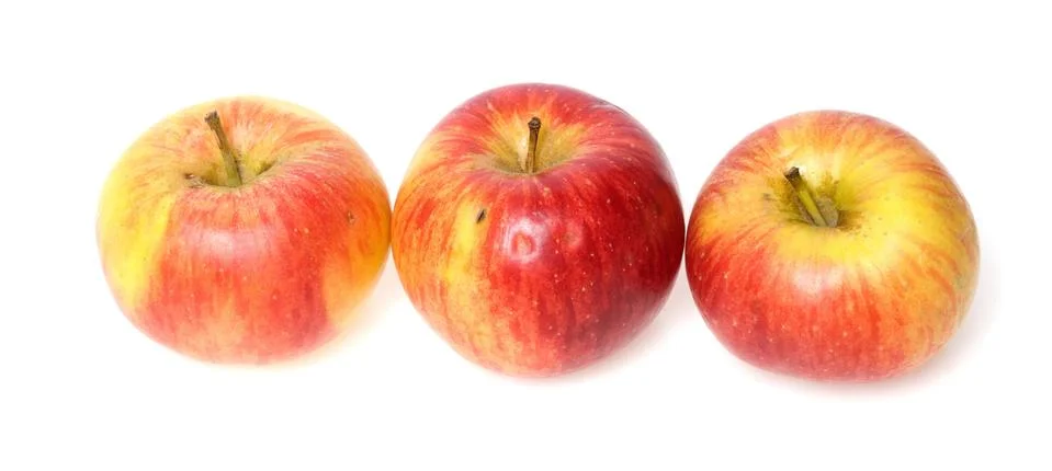 Three aplles on white background Stock Photos