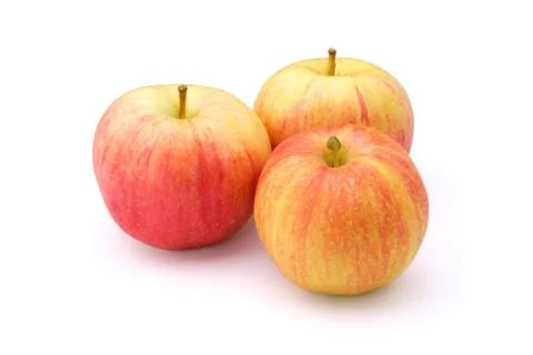 Three apples isolated on a white background. Stock Photos