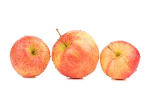 Three apples with red and yellow skin on white background Stock Photos
