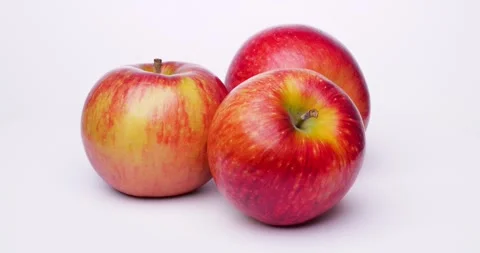 Three apples that turn Stock Footage 250008739