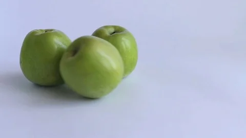 Three apples white background Video stock 74248730
