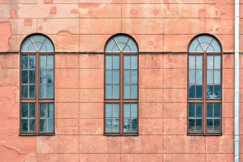 Three arched windows. Stock Photos