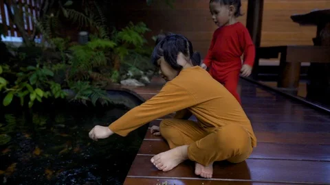 Three asian 1-4 years old kids quarantine stay home good time smiling Stock Footage 128942871