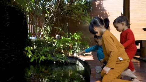Three asian 1-4 years old kids quarantine stay home good time smiling Stock Footage 128946726